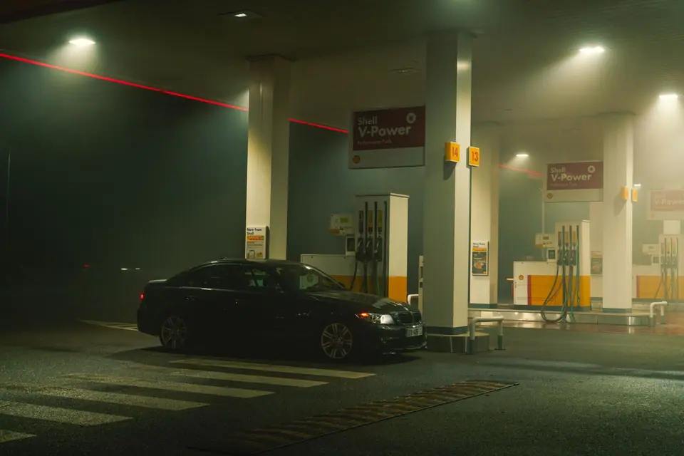 BMW parked in an urban night setting